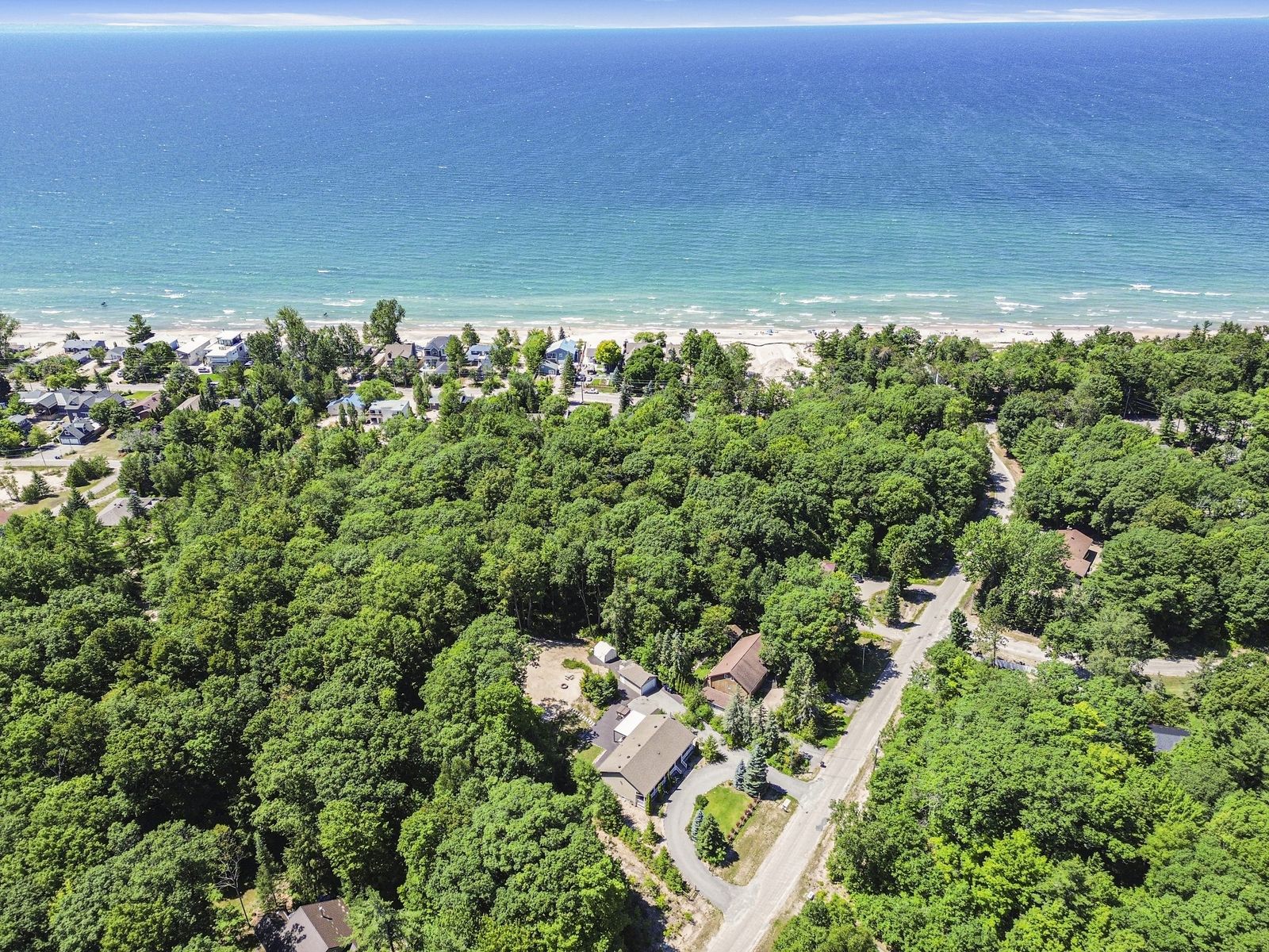 Aerial of a shoreline community and beach, Georgian Bay