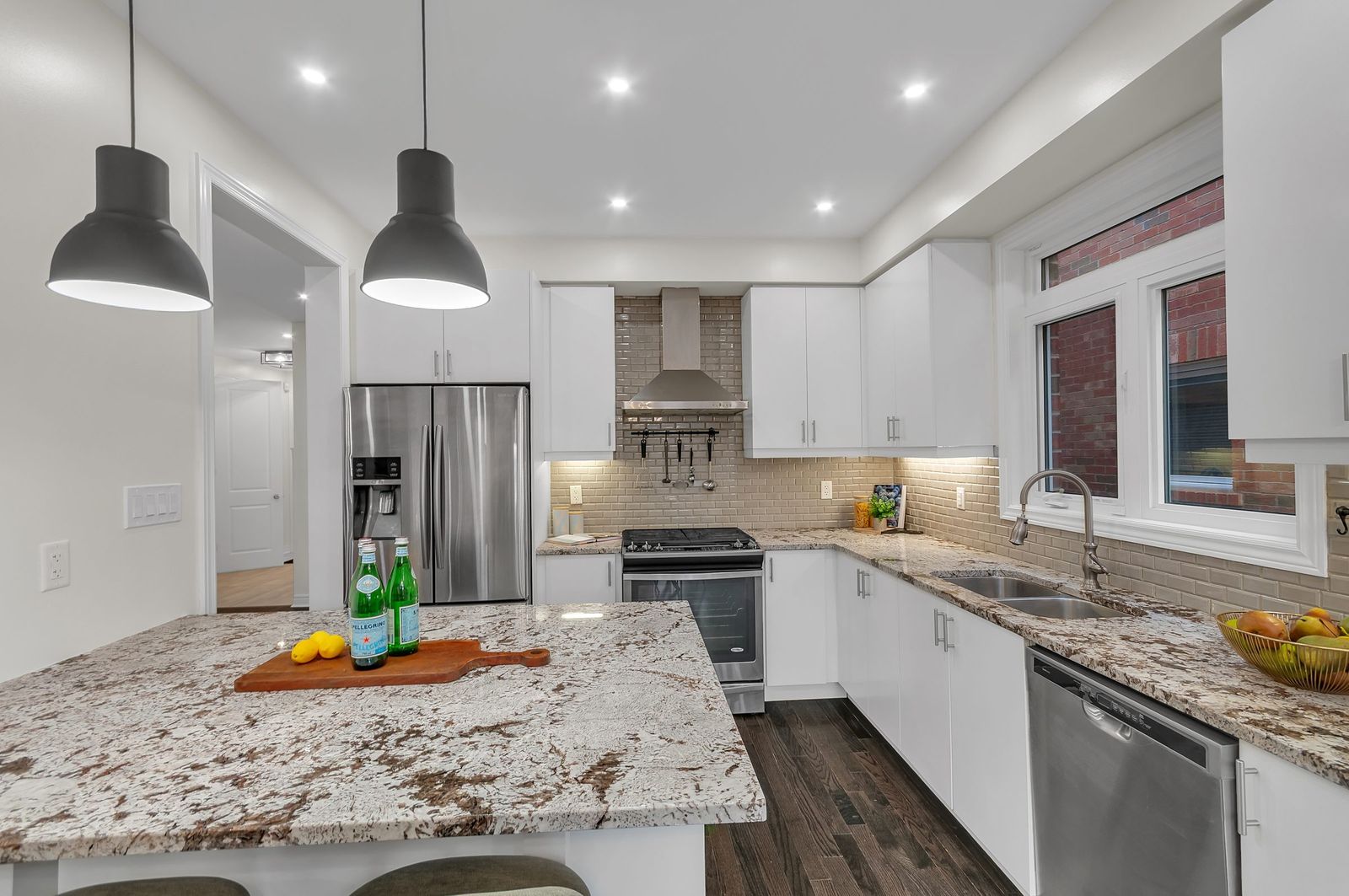Kitchen with granite counters and stainless appliances