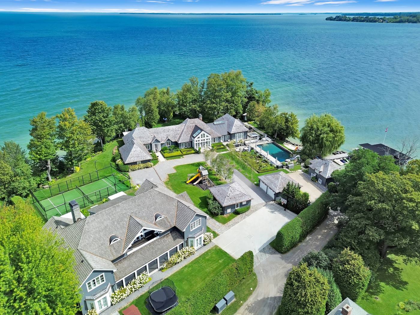 Aerial photo of a lakefront estate listing on Lake Simcoe, shot by AEON Media