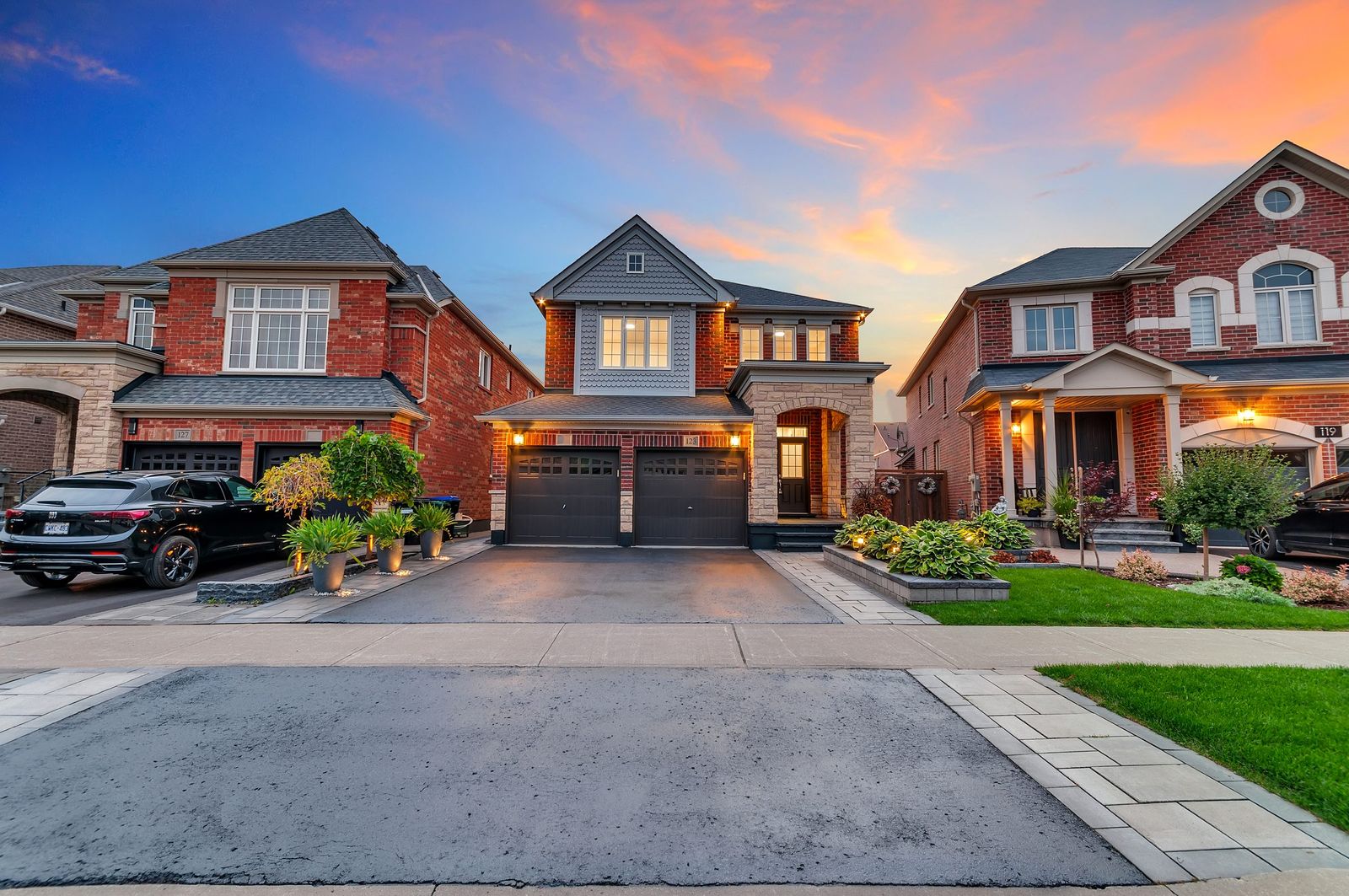 Real twilight photograph of a detached home at dusk in York Region, Ontario