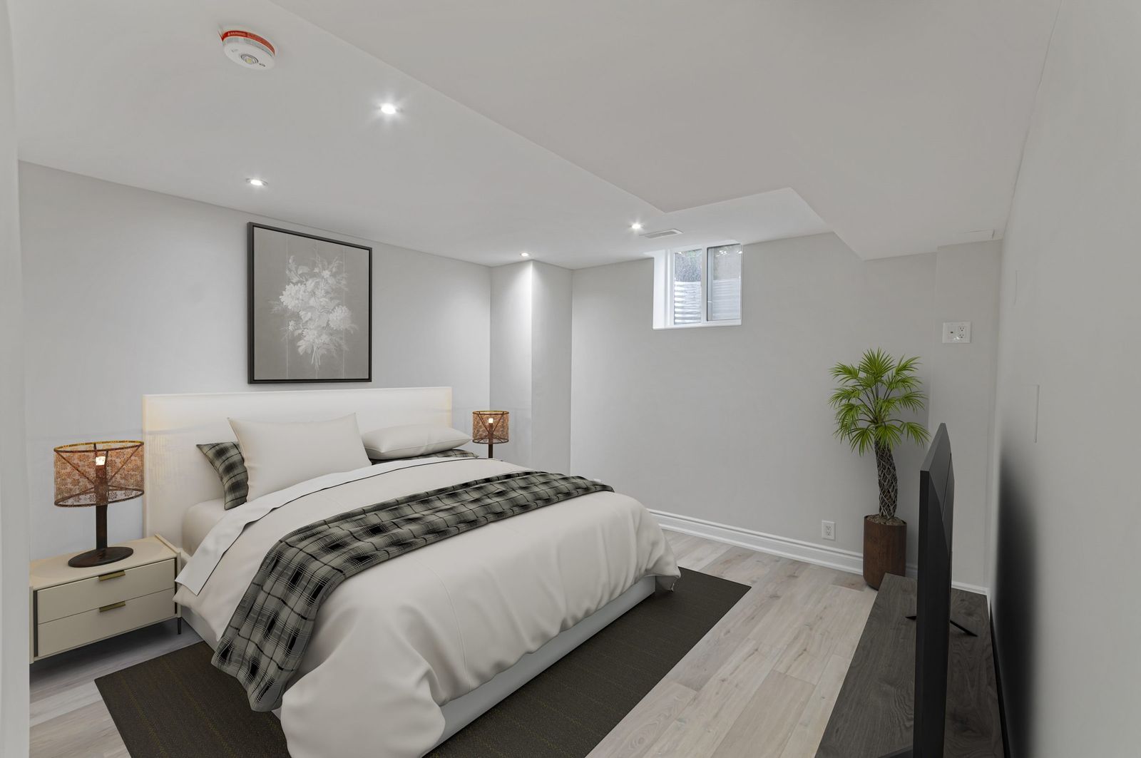 The same basement bedroom, second view after virtual staging — furniture and decor added