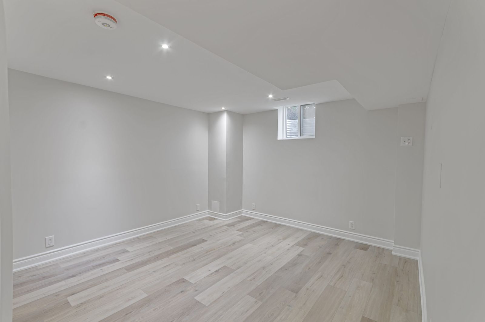 Basement bedroom, second view before virtual staging — empty room, Brampton listing