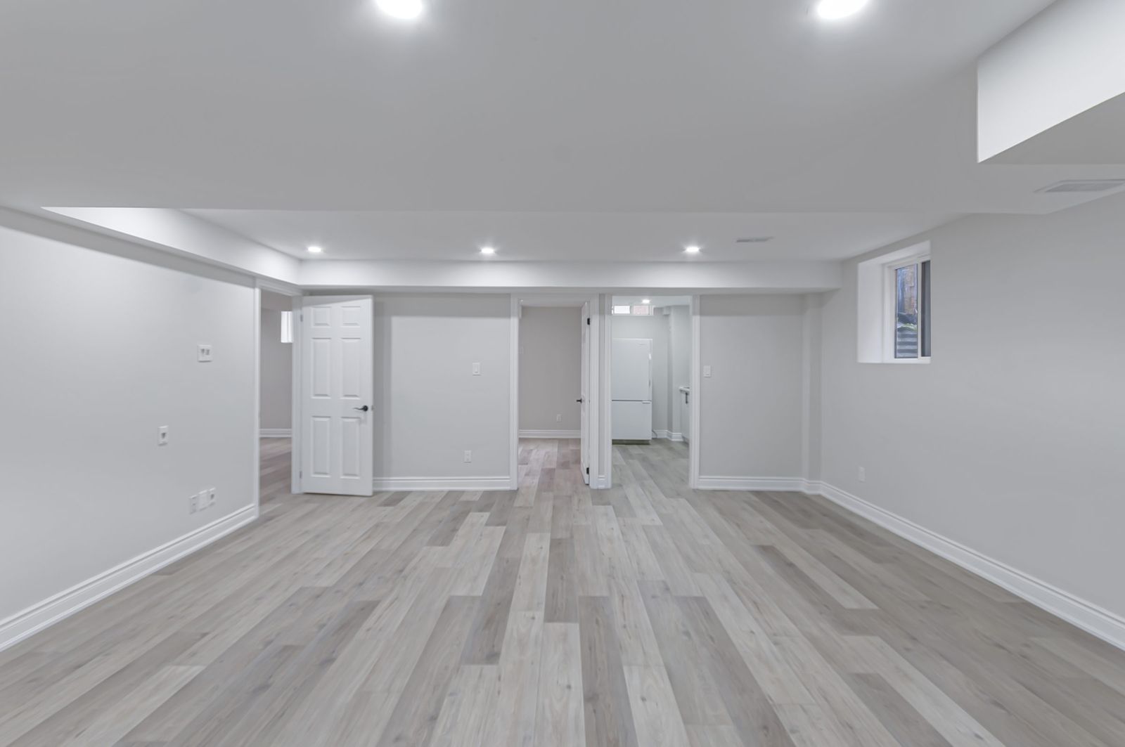 Finished basement rec room before virtual staging — empty room, Brampton listing