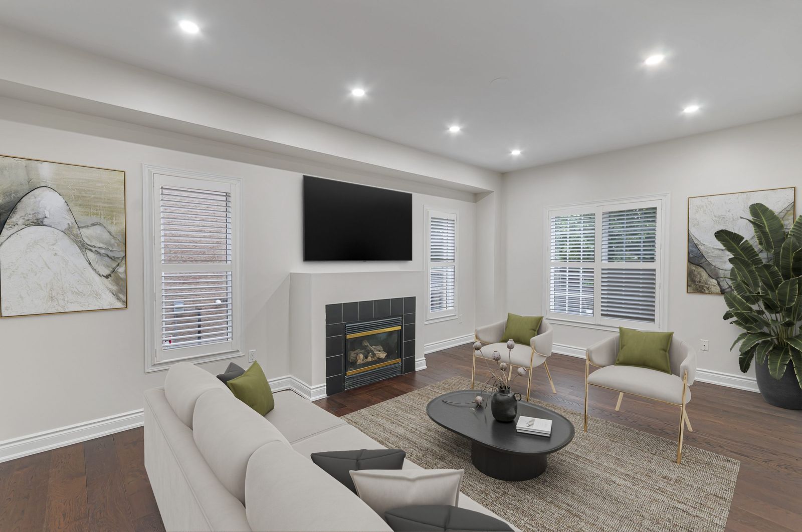 The same living room with fireplace after virtual staging — furniture and decor added