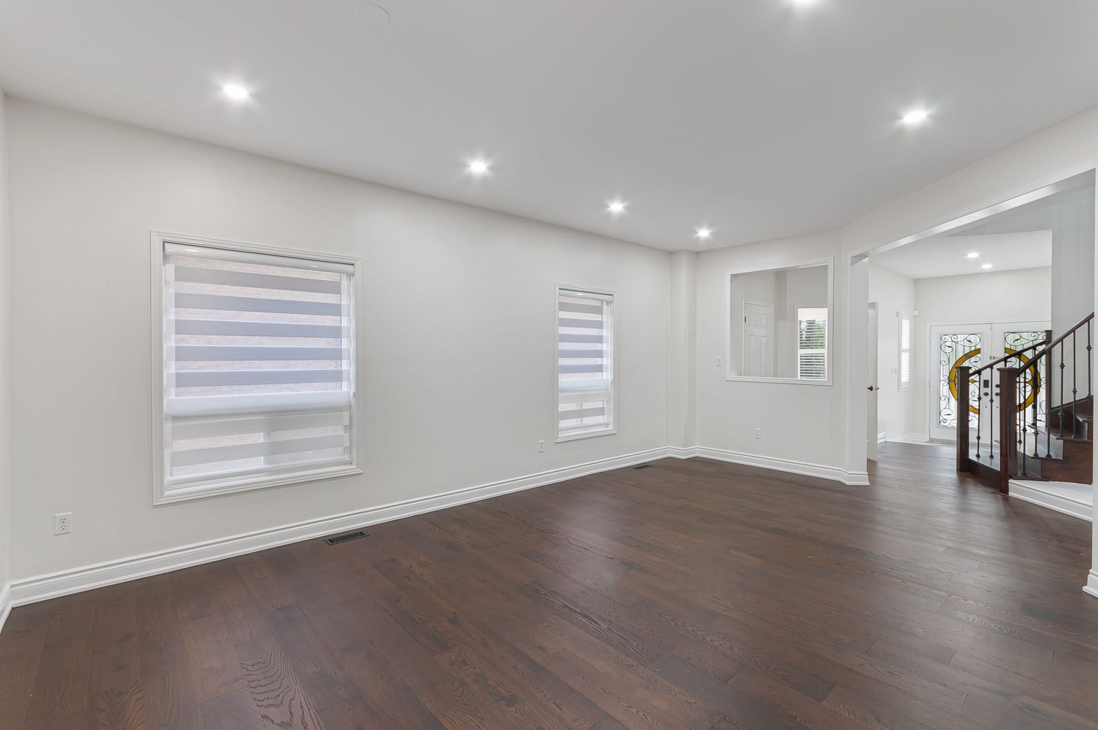 Living and dining, main floor before virtual staging — empty room, Brampton listing