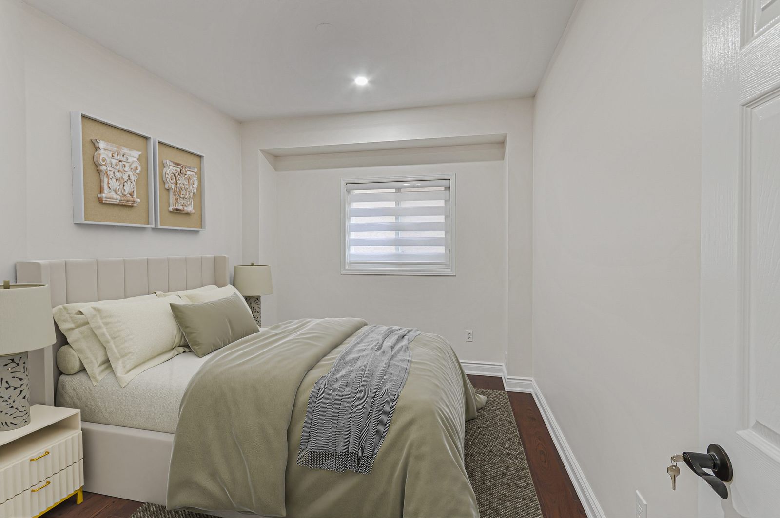 The same second bedroom after virtual staging — furniture and decor added