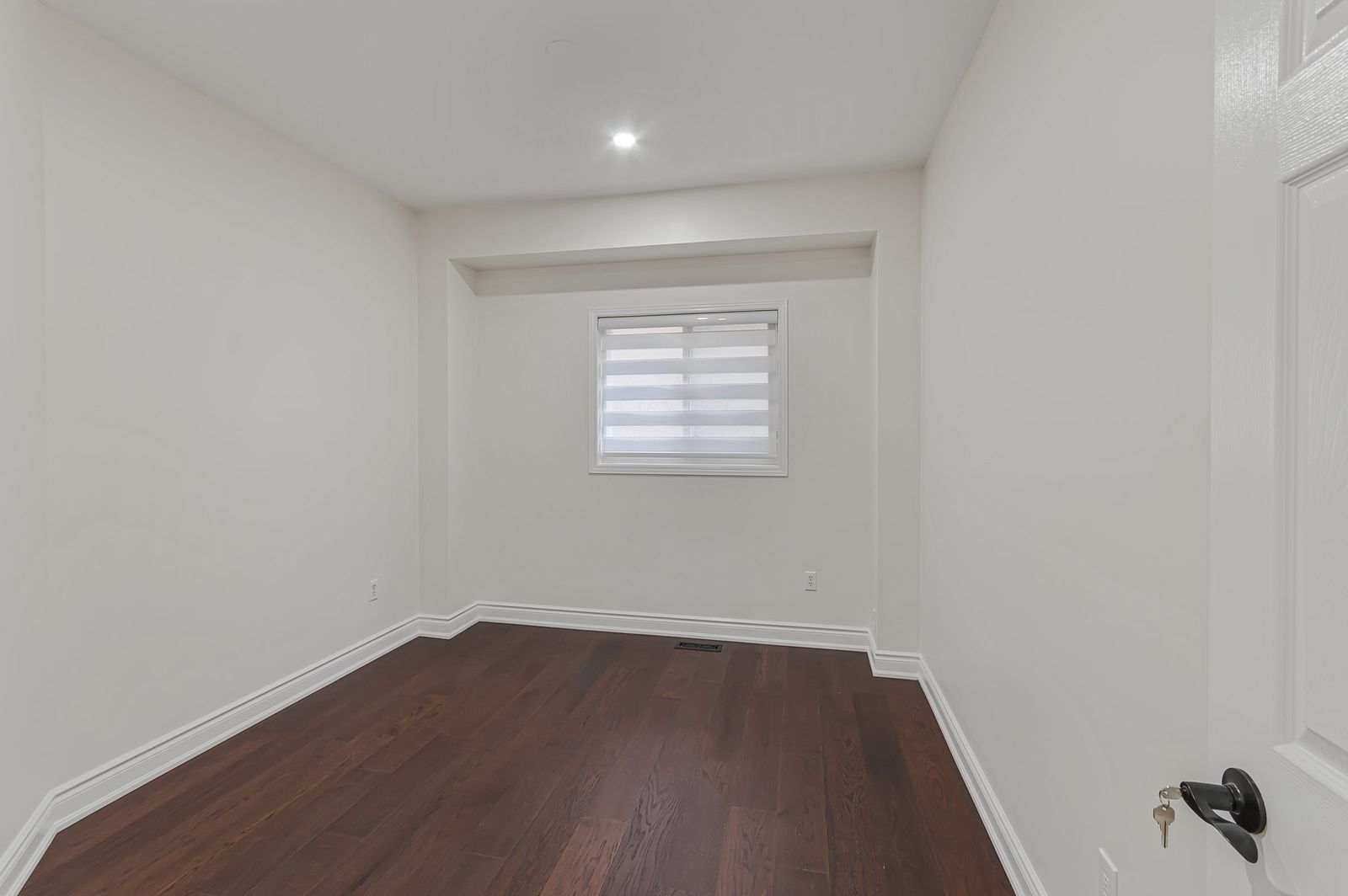 Second bedroom before virtual staging — empty room, Brampton listing