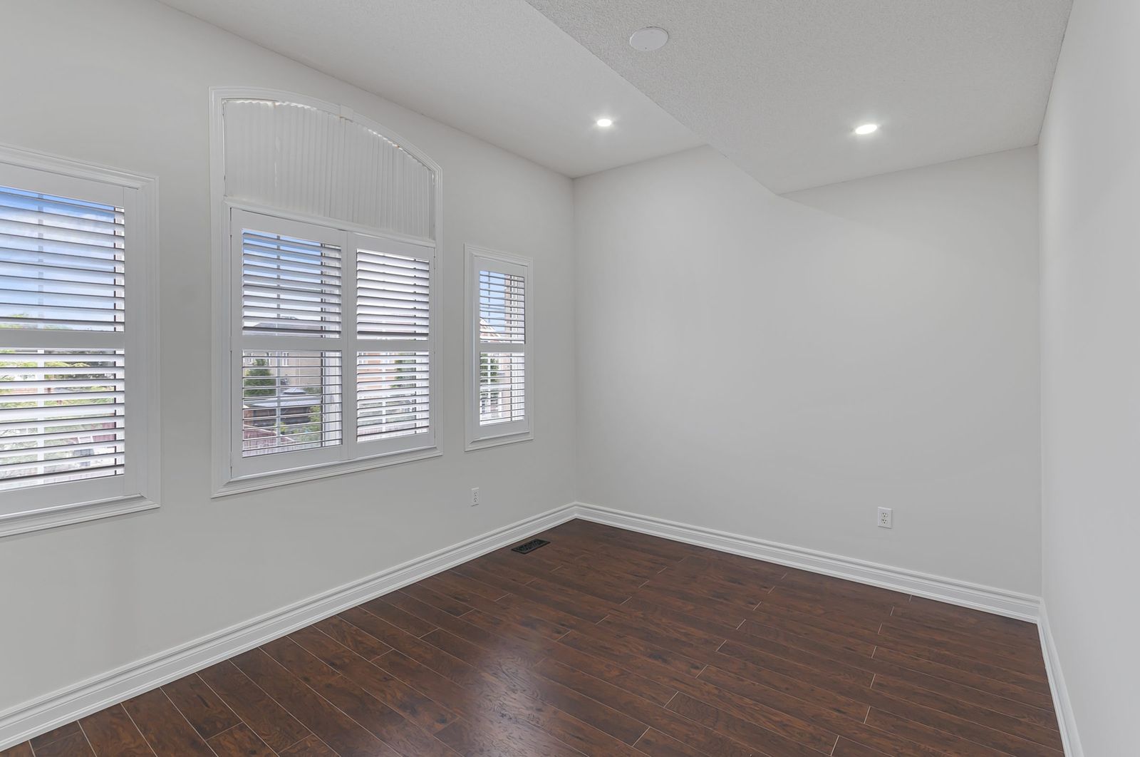 Primary bedroom before virtual staging — empty room, Brampton listing
