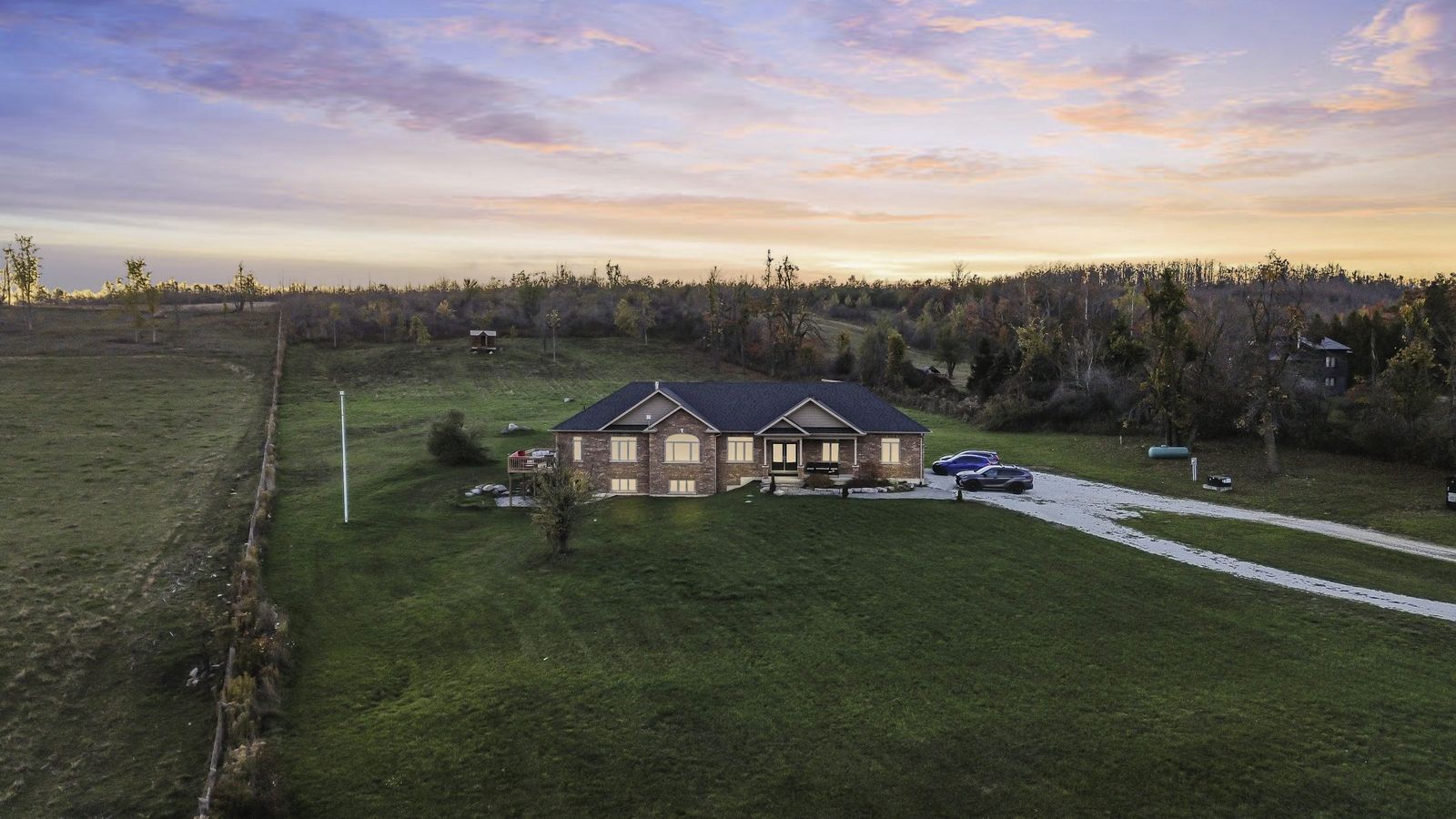 Day-to-dusk conversion of a rural property with long driveway